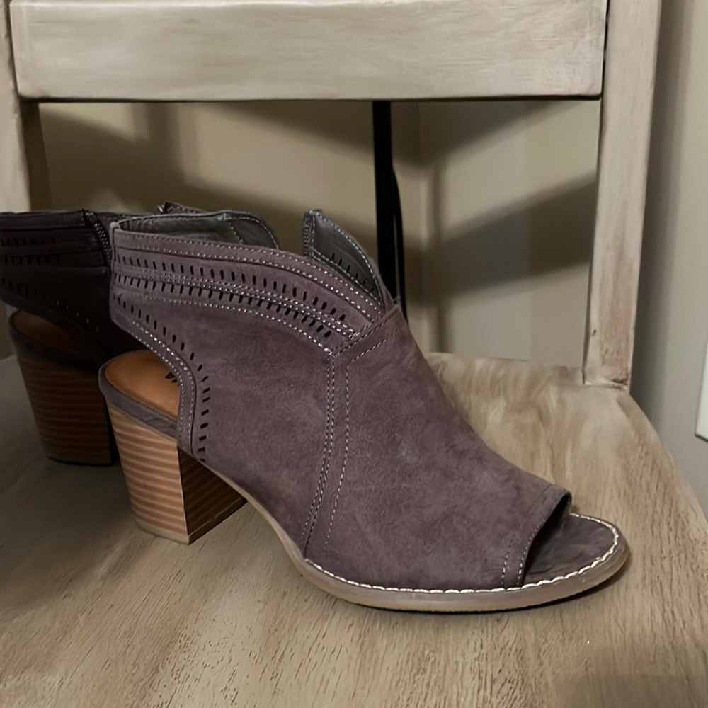 Heeled open toe boot/sandal.